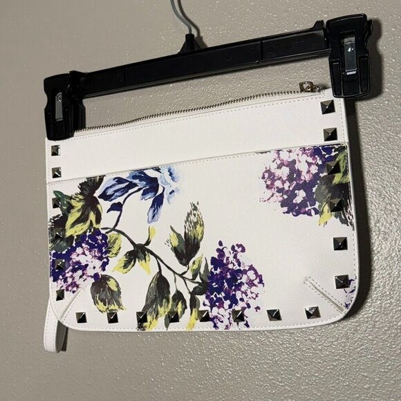 White House Black Market Handbags - White House Black Market, floral and studded clutch.
